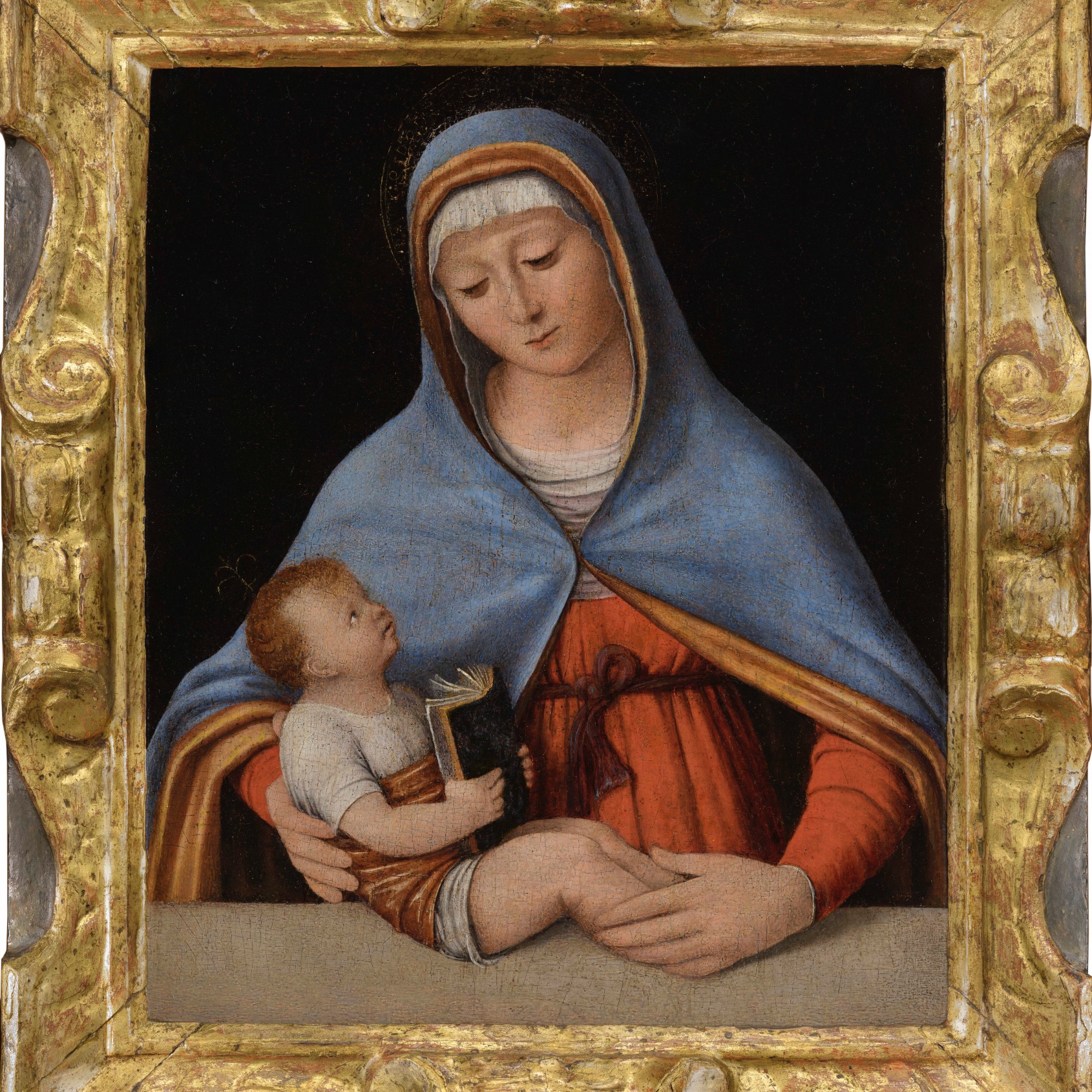 The recovery of the “Madonna and Child reading”  by Andrea Solario
