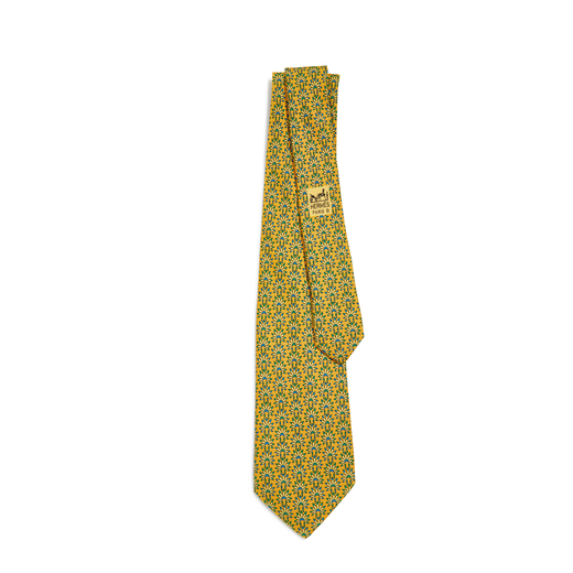 HERMÈS PARIS Cravate en twill 100% soie jaune imprimée à décor tropical, avec boîte et couvre b