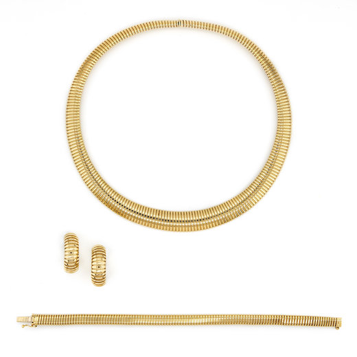 PARURE IN ORO composta da bracciale, paio di orecchini e girocollo in oro con lavorazione a tubo gas