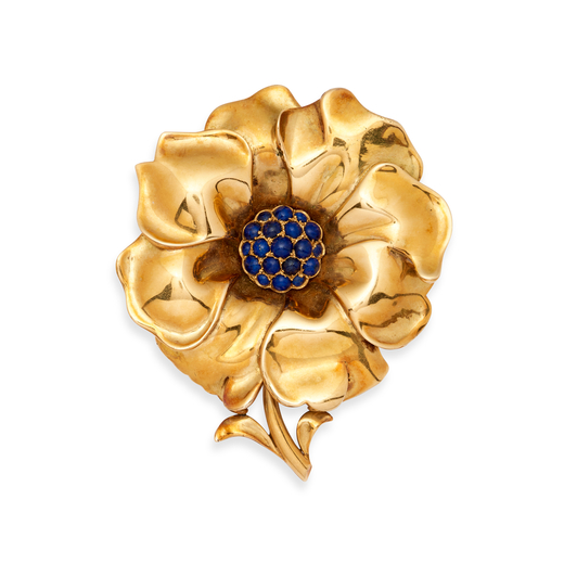 SPILLA IN ORO E LAPISLAZZULI  realizzata come un fiore decorato al centro con lapislazzuli <br>Peso 