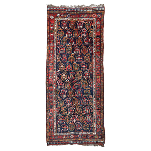 GRANDE TAPPETO KHAMSEH, FARS SUD-OVEST PERSIA, 1870 CIRCA CM 440X172<br>Grande tappeto a fondo blu s