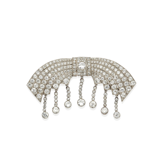 BROCHE/DOUBLE CLIP EN DIAMANTS, CIRCA 1930  stylisée dun nud entièrement décorée de diamants tai