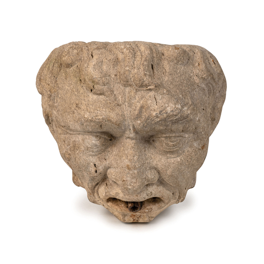 ELEMENTO SCULTOREO IN PIETRA, XVI-XVII SECOLO parte di fontana e raffigurante testa grottesca, nelle