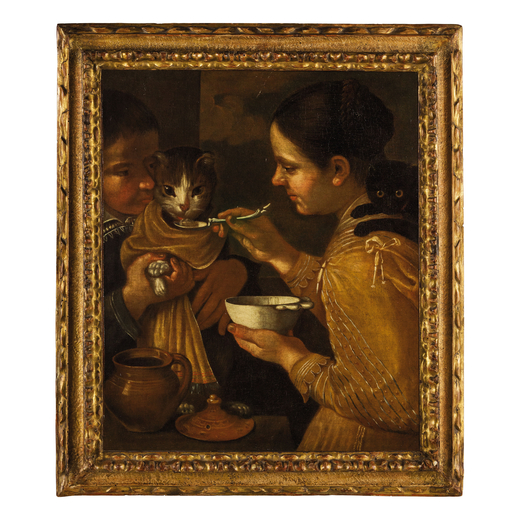 PITTORE LOMBARDO DEL XVII-XVIII SECOLO Donna che imbocca un gatto<br>Olio su tela, cm 57X47<br>