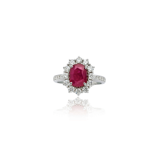 BAGUE EN OR, RUBIS ET DIAMANTS ornée dun rubis de taille ovale entouré de diamants, poinçon 750 e