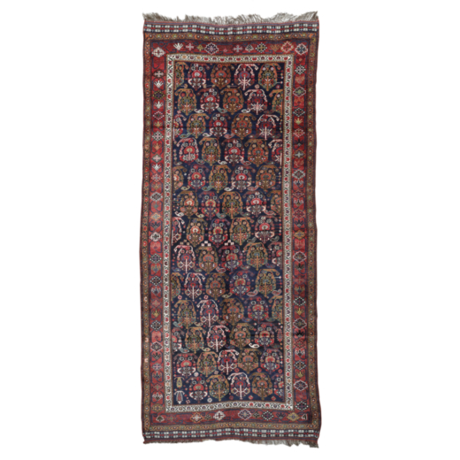 GRANDE TAPPETO KHAMSEH, FARS SUD-OVEST PERSIA, 1870 CIRCA CM 440X172<br>Grande tappeto a fondo blu s