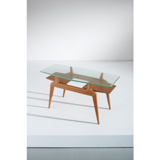 MANIFATTURA ITALIANA Tavolino. Legno di faggio, legno di frassino, cristallo molato. Italia anni 50<
