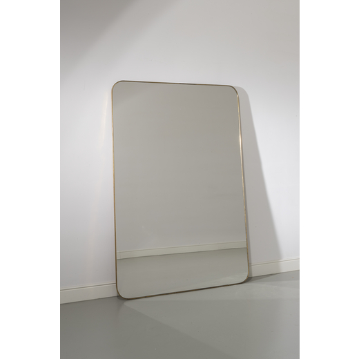 MANIFATTURA ITALIANA Specchio da parete. Ottone, cristallo specchiato. Italia anni 50 ca.<br>cm 179x
