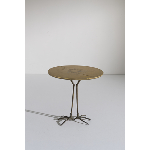 MERET OPPENHEIM Tavolino, modello Traccia <br>Gambe in fusione di bronzo, piano in legno decorato A 