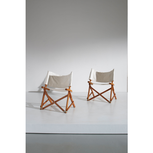 ZONOTTA Coppia di sedie pieghevoli. Legno di frassino, tessuto, metallo. Italia anni 80.<br>cm 75x58
