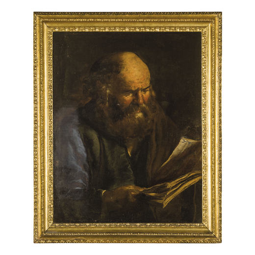 PITTORE CARAVAGGESCO DEL XVII SECOLO Vecchio che legge<br>Olio su tela, cm 73X57
