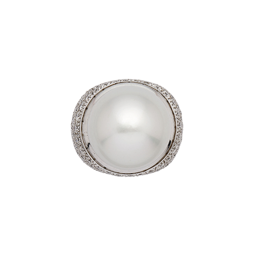 BAGUE EN OR, PERLE DE CULTURE ET DIAMANTS  décorée avec une perle australienne de mm 18.86 environ