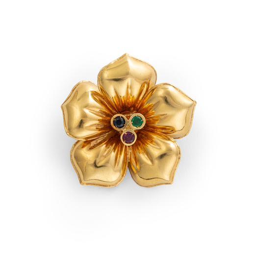 SPILLA IN ORO, RUBINO, ZAFFIRO E SMERALDO a forma di fiore in oro con al centro un rubino, zaffiro e