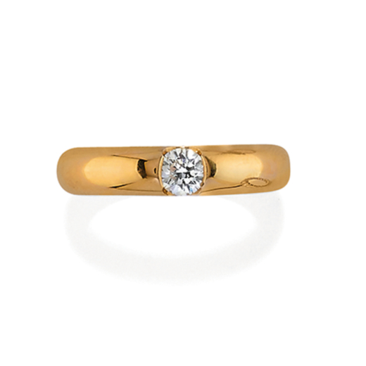 BAGUE SOLITAIRE DIAMANT SIGNÉE CARTIER En or jaune avec diamant central pesant 0.45 ct, poinçon or