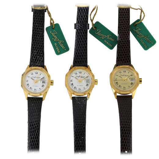 JUNGFRAU, LOTTO DI 3 OROLOGI DA POLSO IN ORO, CIRCA 1980 lotto di 3 orologi con casse in oro diametr