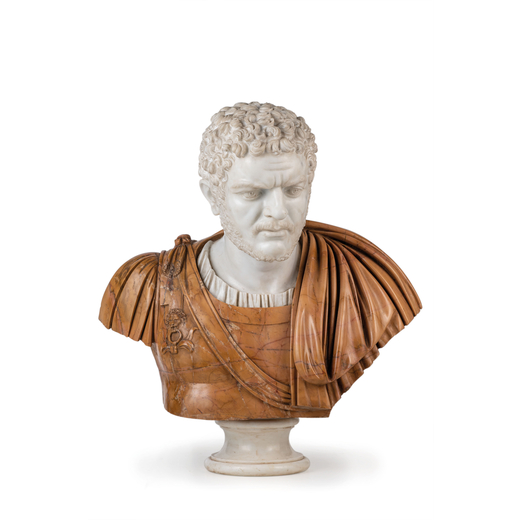 SCULTURA IN MARMI DIVERSI tratto da repertori classici e raffigurante busto di Caracalla, su base a 