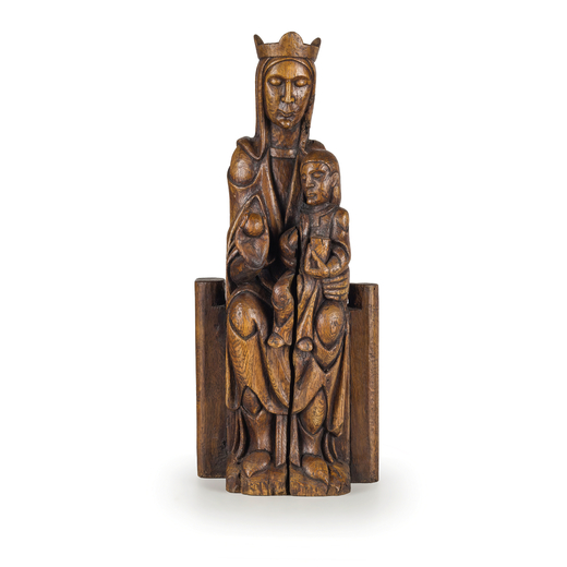 SCULTURA IN LEGNO A PATINA SCURA, XIX-XX SECOLO di gusto gotico raffigurante la Vergine assisa col B