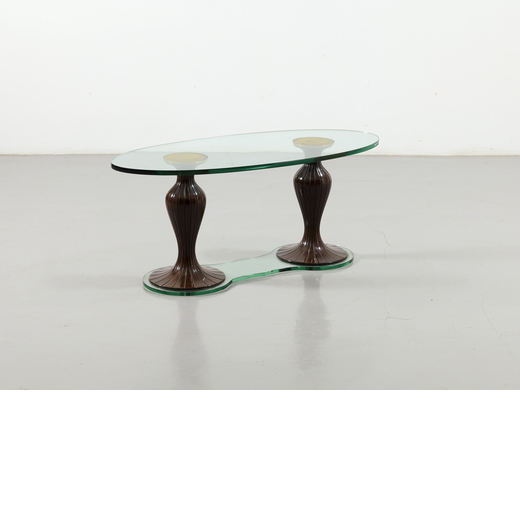 MANIFATTURA ITALIANA   Tavolino. Legno tornito, cristallo molato. Italia anni 50.<br>cm 48x114x42