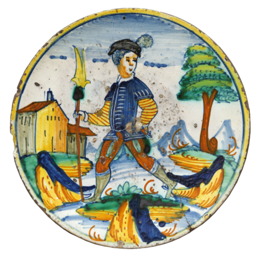 PIATTO IN MAIOLICA POLICROMA, FORNACE DI MONTELUPO, XVII SECOLO decorato con figure di armigero in u