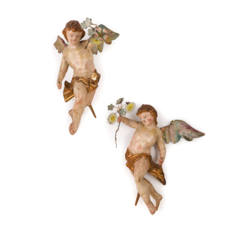 COPPIA DI SCULTURE IN LEGNO LACCATO E DORATO, XIX SECOLO raffiguranti angeli con tralcio fiorito in 