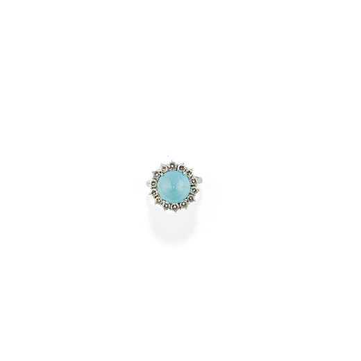 BAGUE EN OR,TURQUOISE ET DIAMANTS au centre ornée dun bouton en turquoise entouré par les diamants
