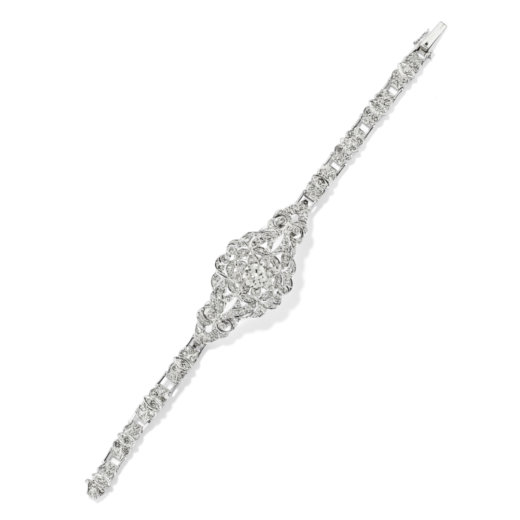BRACELET EN OR ET DIAMANTS  Bracelet en diamants taille brillant pour environ 3 cts,ornée au centre